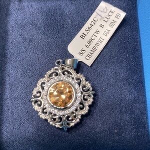 Bella Luce sterling silver champagne and white diamond simulant pendant 6.09 CTW
